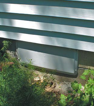 A gray crawl space vent cover in Hershey